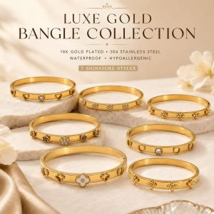 Elegant gold plated bangle bracelet collection displayed on a soft luxury beige background