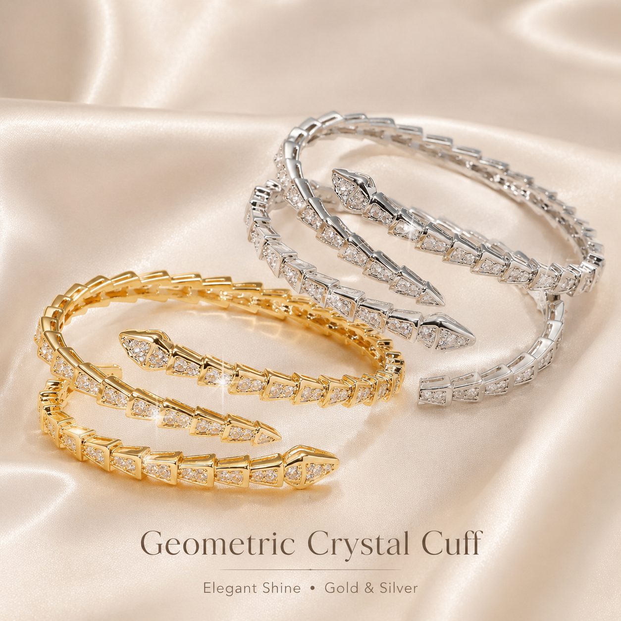 Geometric crystal cuff bracelet in gold and silver tones on satin background