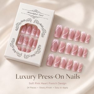 Soft pink heart French press-on nails with glossy finish, rhinestone accents, and elegant white packaging box