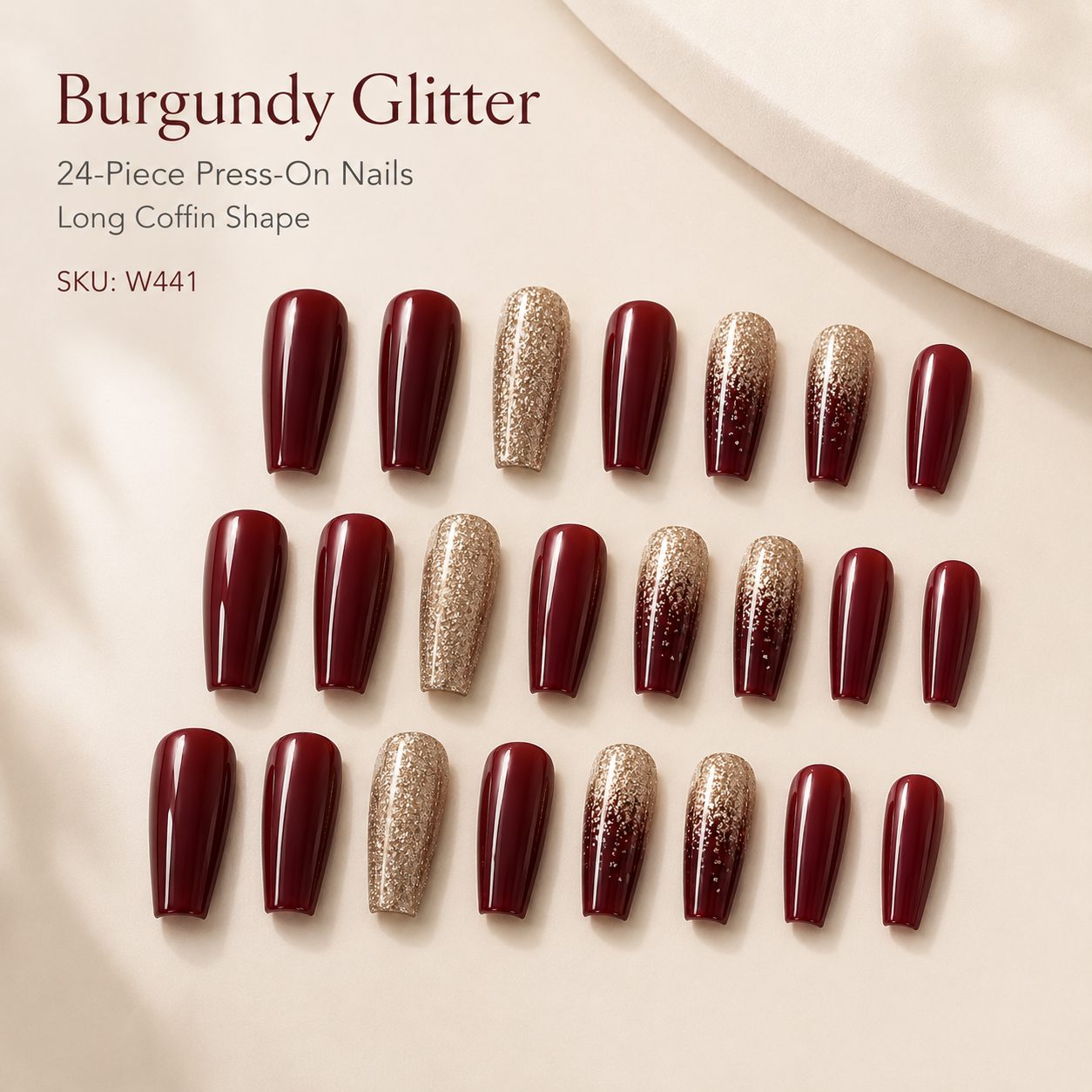 SKU W441 burgundy glitter 24-piece press-on nails set with glossy wine red finish, champagne gold glitter accents and long coffin shape