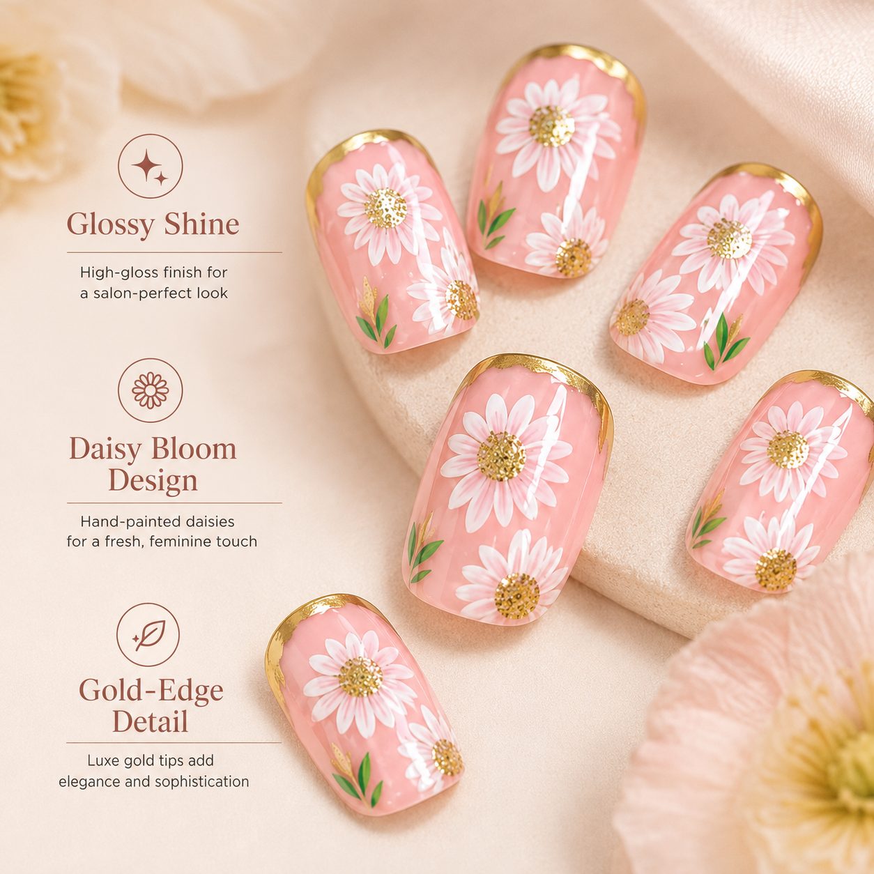 close up of daisy press on nails with glossy pink finish white flowers and gold edge detail